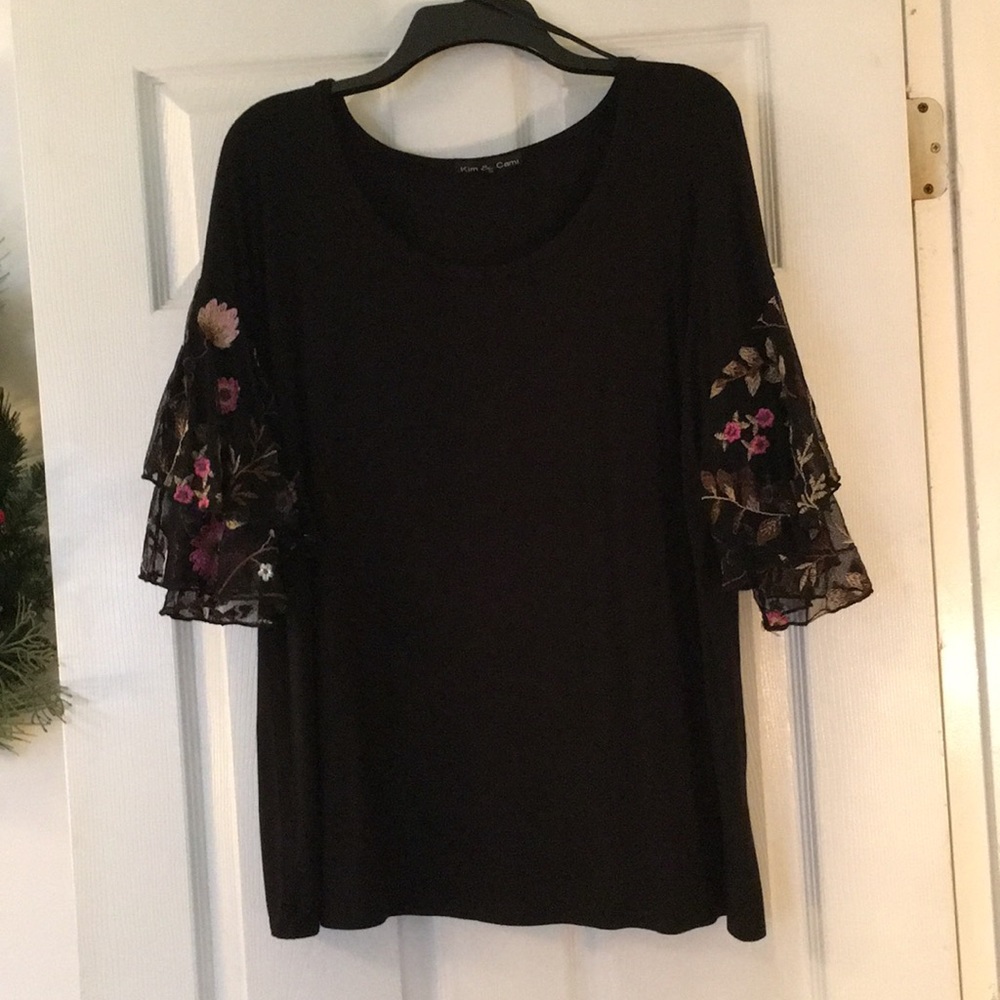 Black shirt with embroidery on 3/4 length sleeves